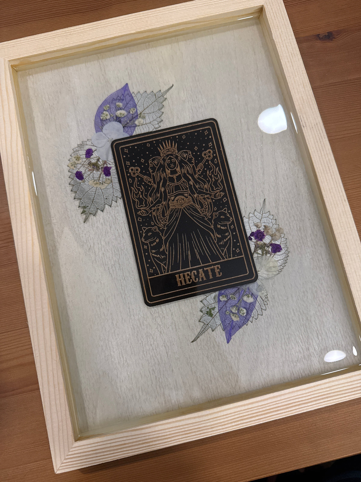 Hecate Black Card Wood Art Piece with Purple and White Pressed Flowers