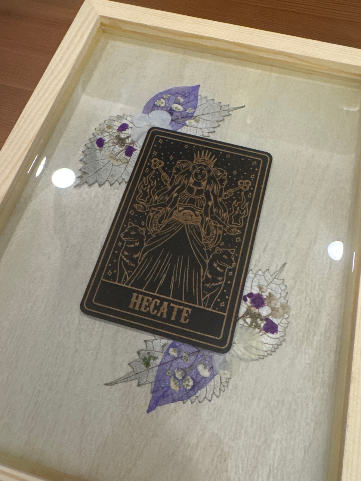 Hecate Black Card Wood Art Piece with Purple and White Pressed Flowers