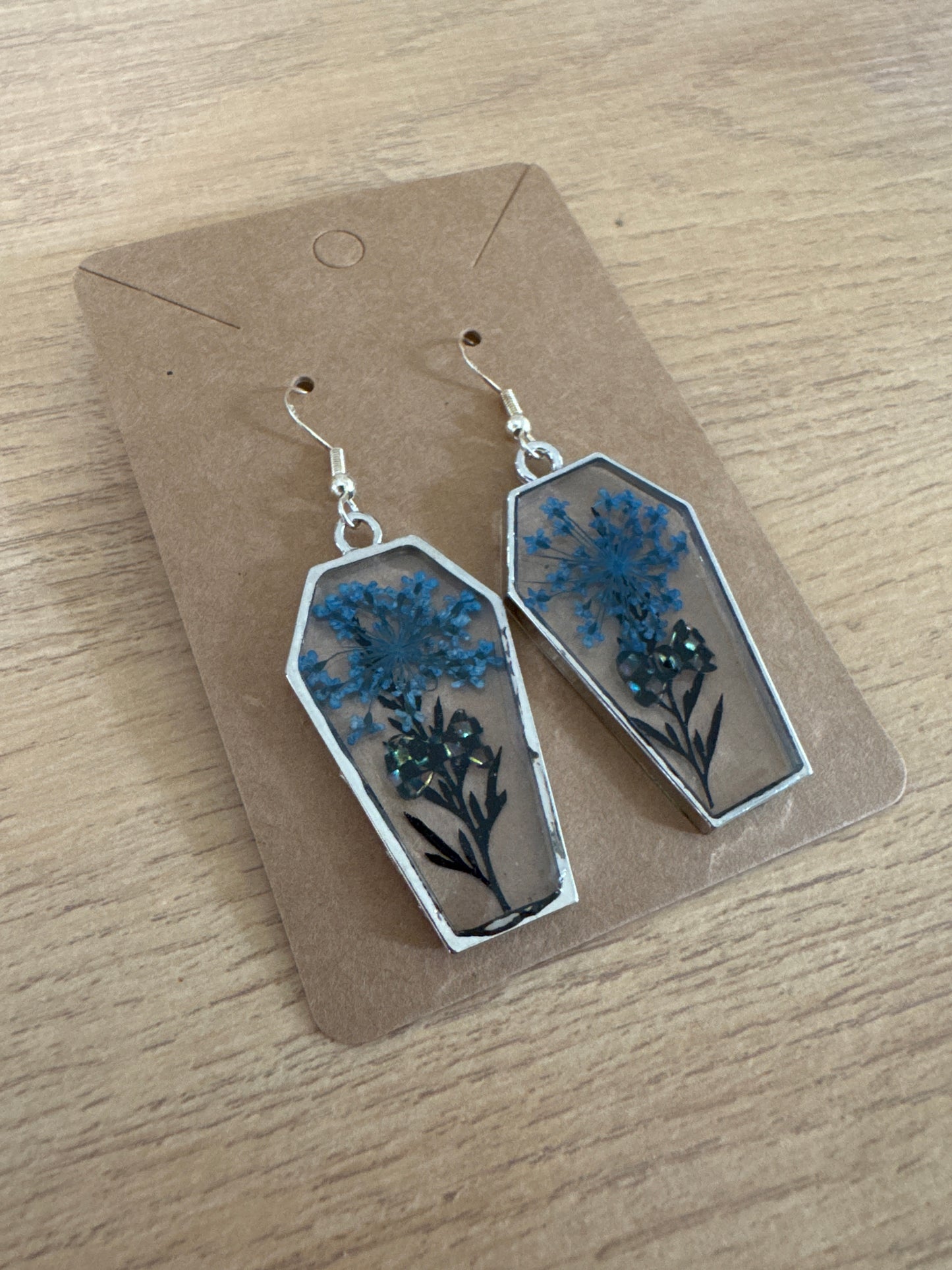 Silver Coffin-shaped Blue and Bow Resin Earrings