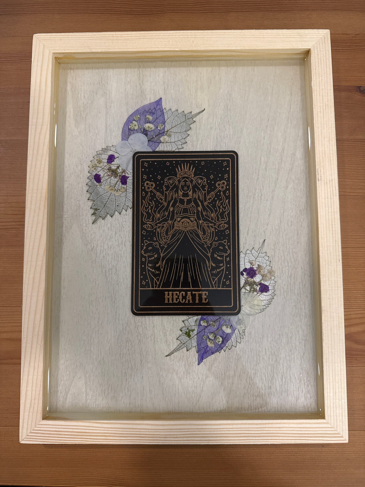 Hecate Black Card Wood Art Piece with Purple and White Pressed Flowers