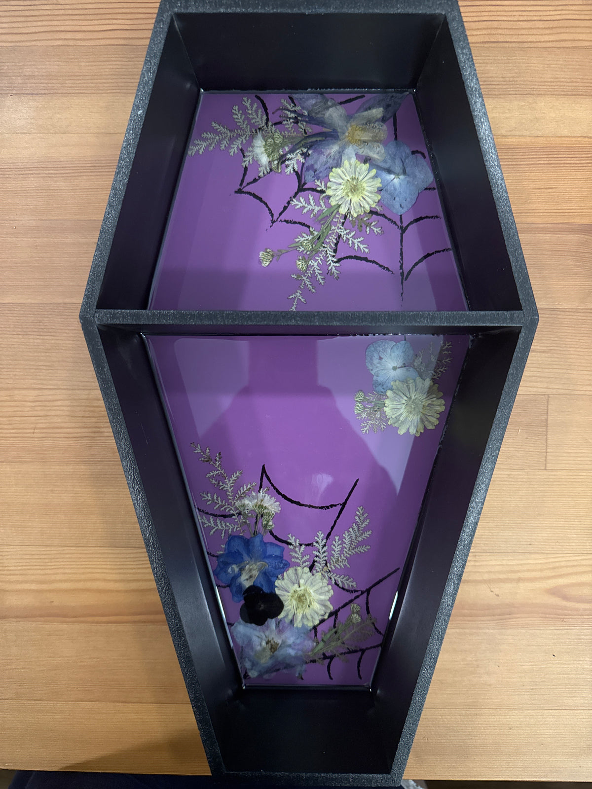 Coffin Shaped Black Resin Shelf with Yellow and Purple Pressed Flowers