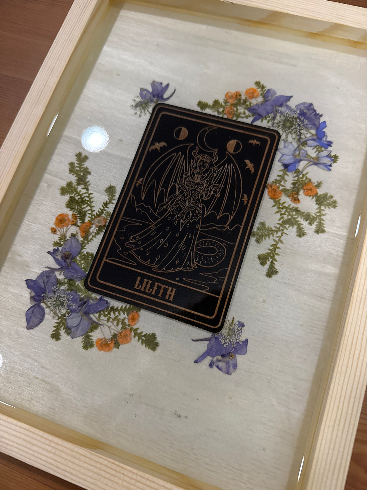 Lilith Black Card Wood Art Piece with Purple and Orange Pressed Flowers