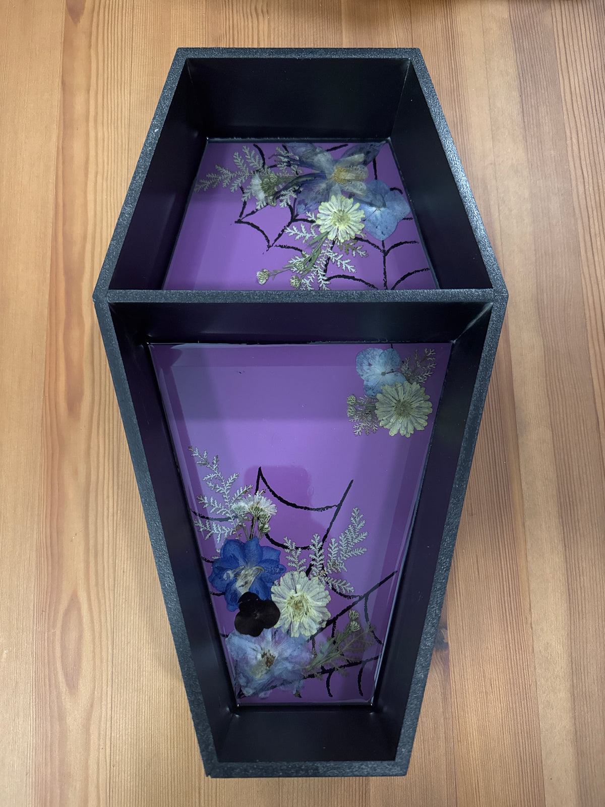 Coffin Shaped Black Resin Shelf with Yellow and Purple Pressed Flowers